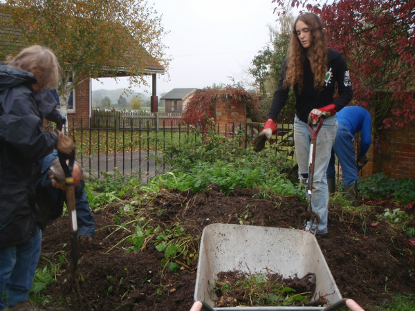 Volunteers preparing site