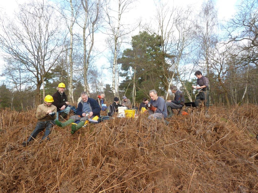 Volunteers enjoying baked potatoes for lunch